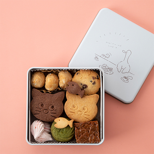〈あひる菓子店〉あけたらネコのクッキーだった缶
